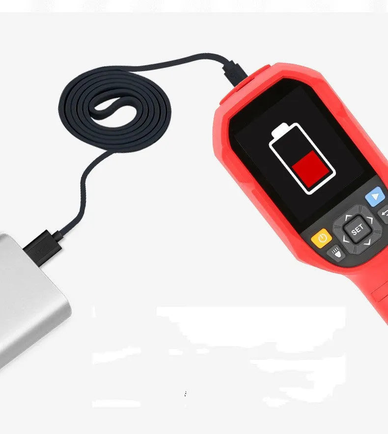 UTi series handheld infrared thermal imager on a table with USB cable and storage card.