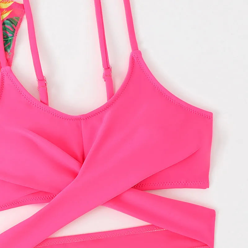 Floral print two-piece bikini swimsuit for girls on a mannequin.
