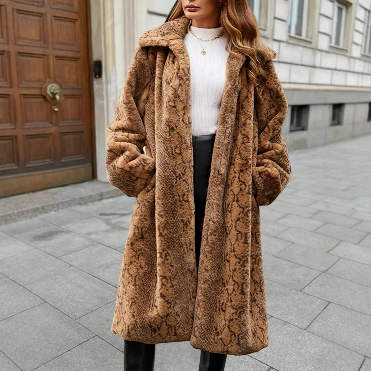 Women's white leopard print faux fur over-the-knee coat with plush fabric.