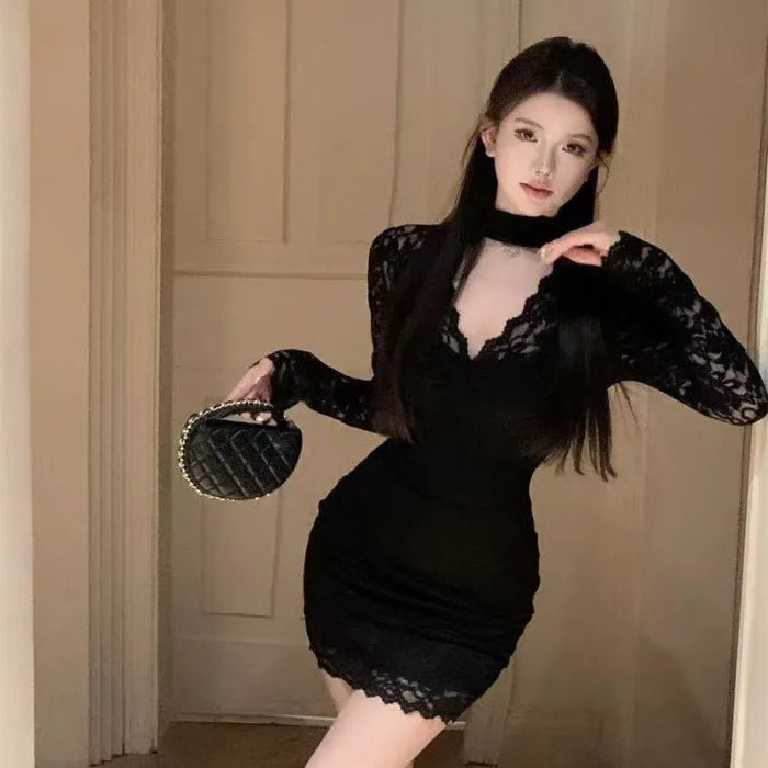 Women's black halter lace A-line dress with a high waist and hip-wrap design.