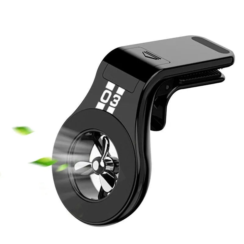 Black magnetic car phone holder mounted on vehicle air vent with smartphone attached