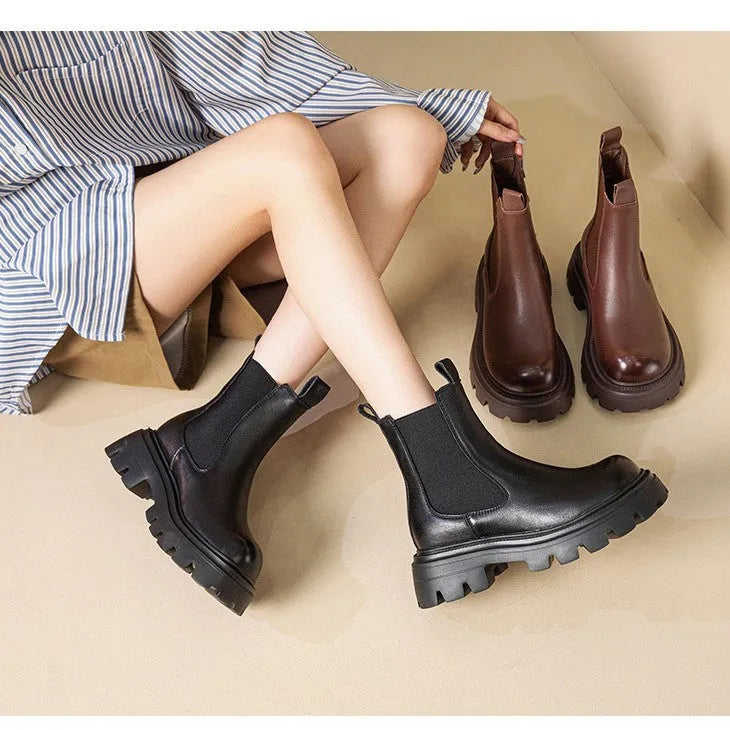 Women's brown brushed cowhide Martin boots with high horseshoe heel, round toe, and thick rubber sole