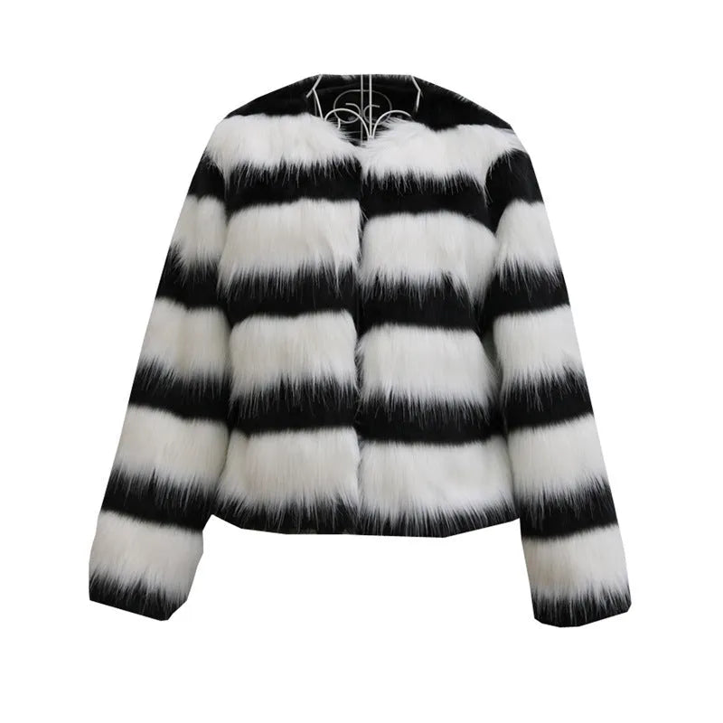 Black and white striped faux fur leather jacket for women, shown in a street fashion style.