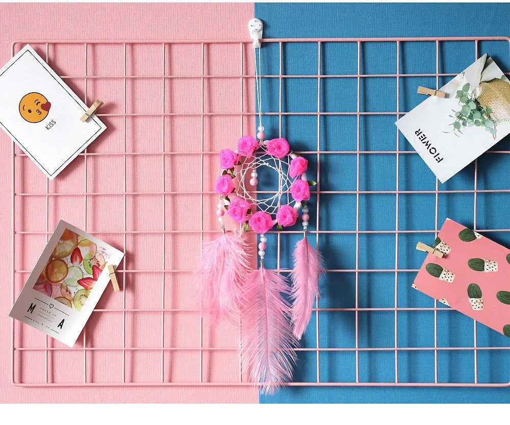 Pink ostrich feather dreamcatcher wind chime wall ornament measuring 10cm