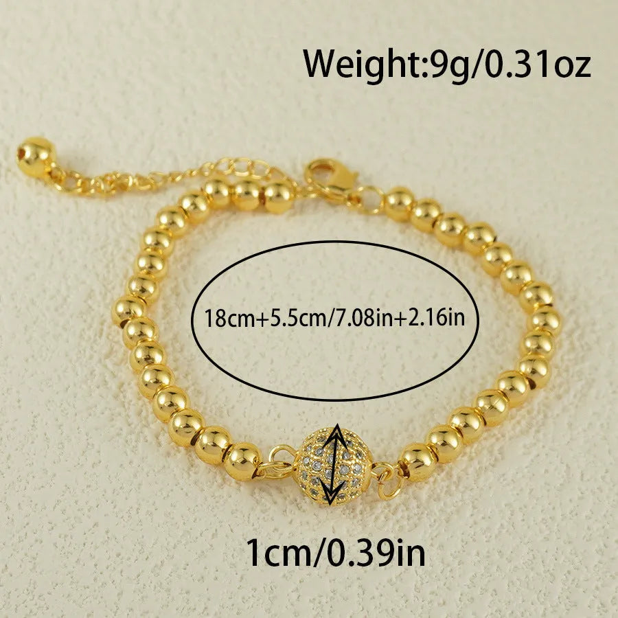 Heart-shaped copper bracelet with round zircon stones in an Arabic style.