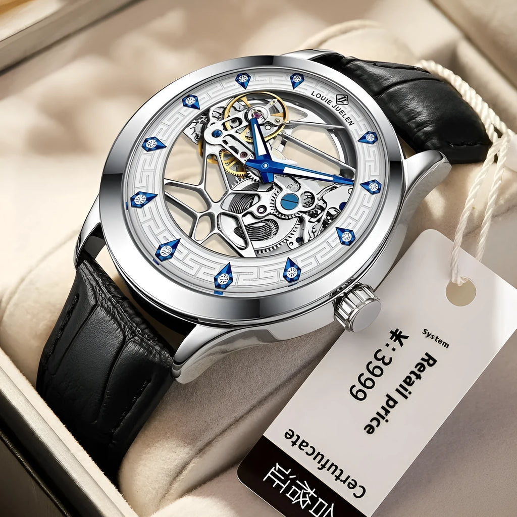Silver men's mechanical watch with white dial, blue luminous hands, and a black leather strap.