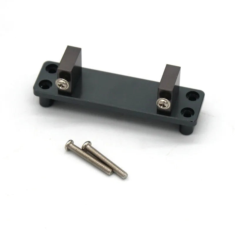 Grey alloy metal accessories for military remote control car including bars, beams, axles, and motor box