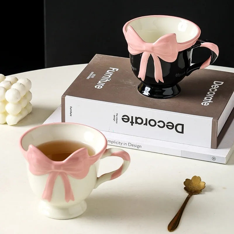 Ceramic mug with girl heart bow design in black pink or white powder colours, 301-400ml capacity