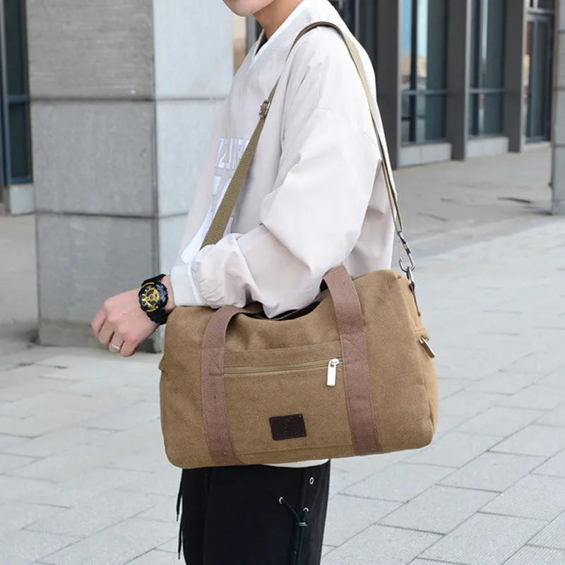 Men's canvas travel duffel bag in army green with three straps and polyester material