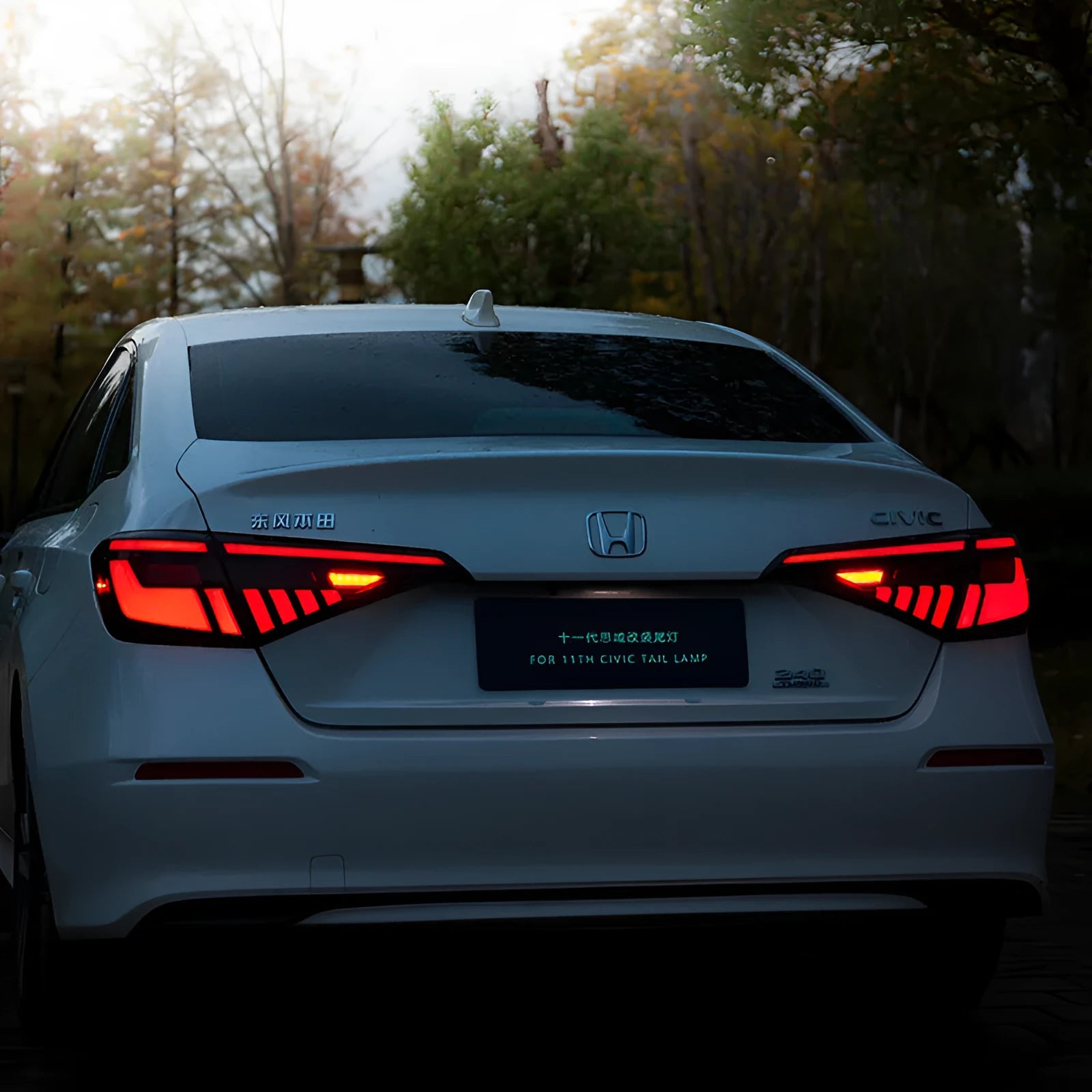 11th generation Honda Civic black and red LED aftermarket taillight assembly.