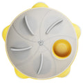 Yellow pet entertainment plate for cats serving as dual-purpose snack bowl and interactive toy