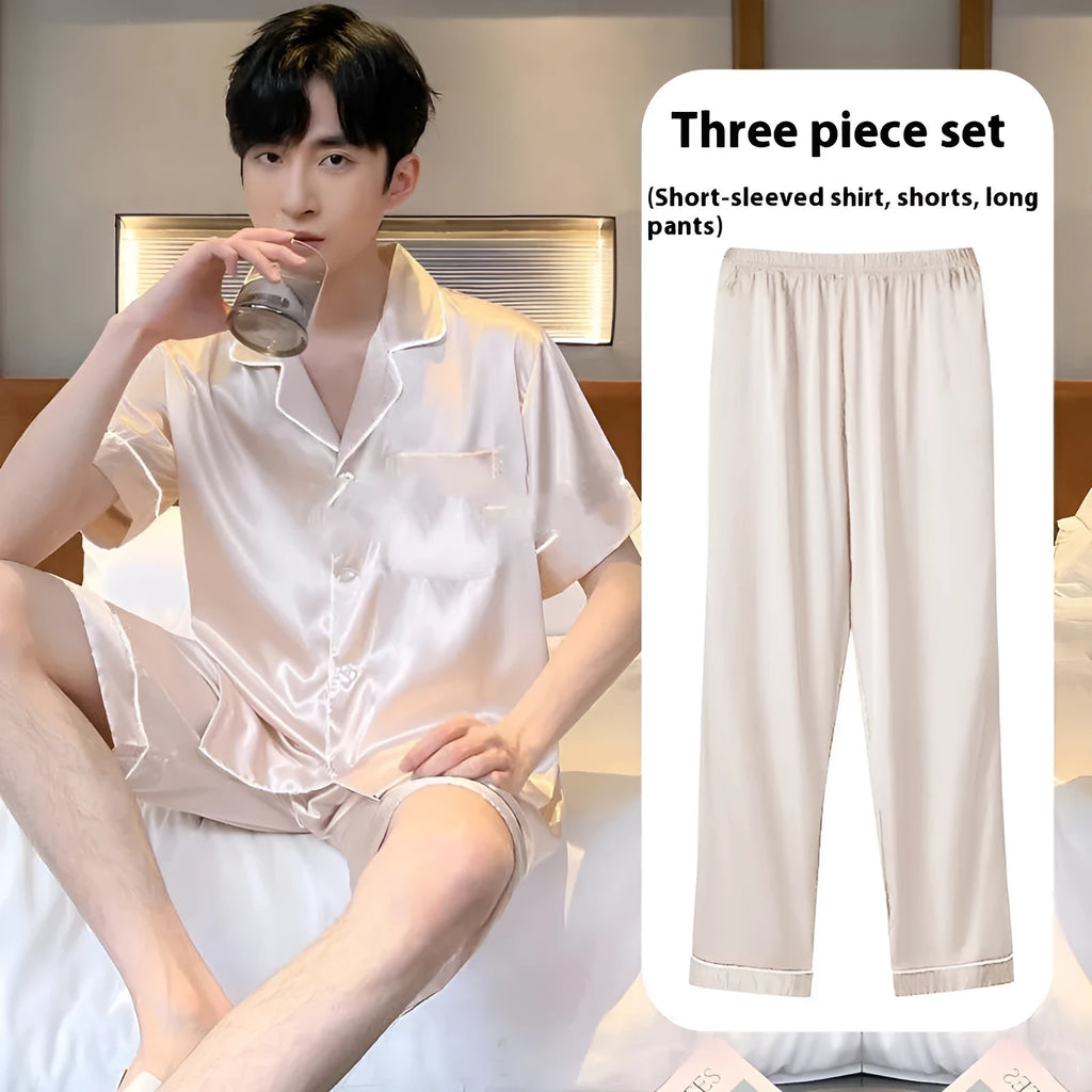 Men's black ice silk three-piece loungewear set with shorts and trousers on a hanger.