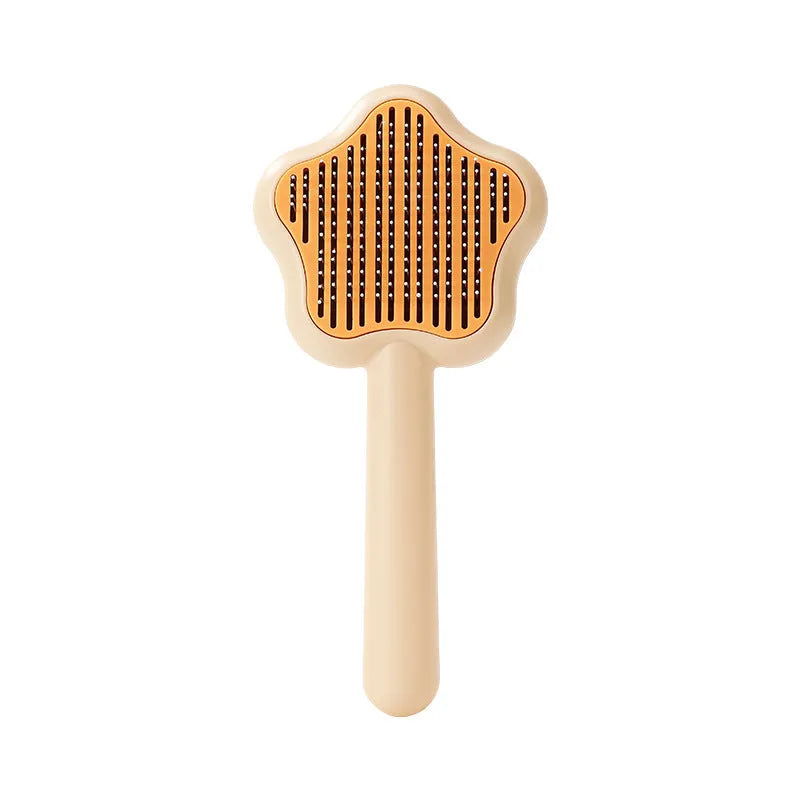 Green self-cleaning cat comb with stainless steel needle teeth and 20 cm handle