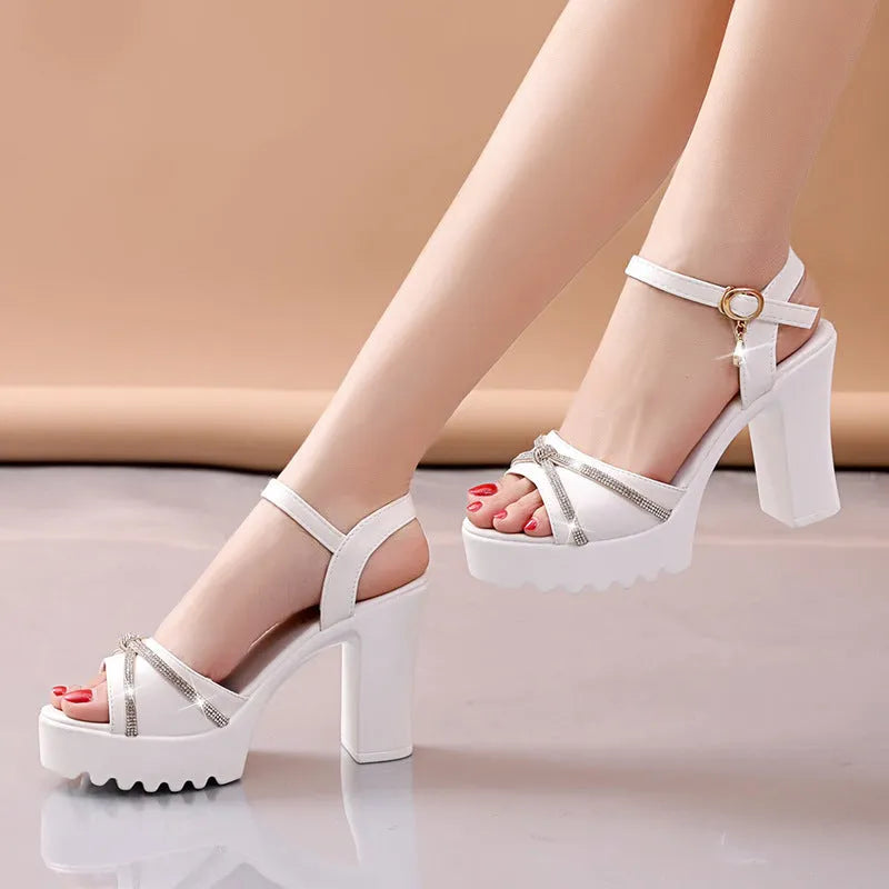 Women's black and white high heel sandals made from PU material, shown in available sizes 35-42.
