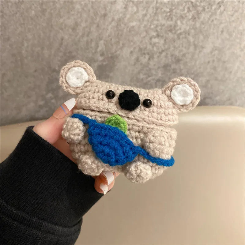 Hand-knitted koala bear backpack design cover for Apple AirPods case.