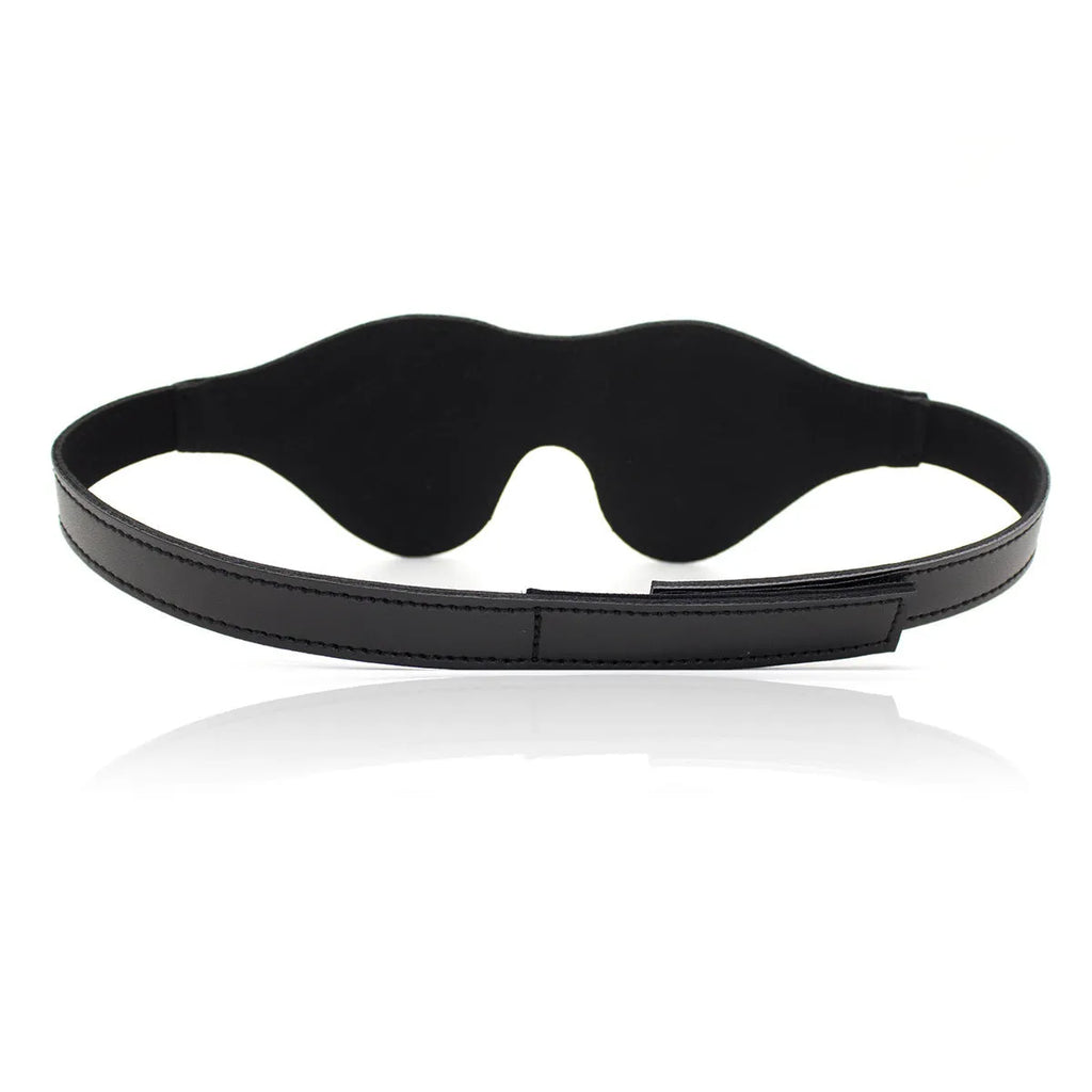 Women's leather eye mask with velcro fastening showing three-dimensional contour design in multiple colour options