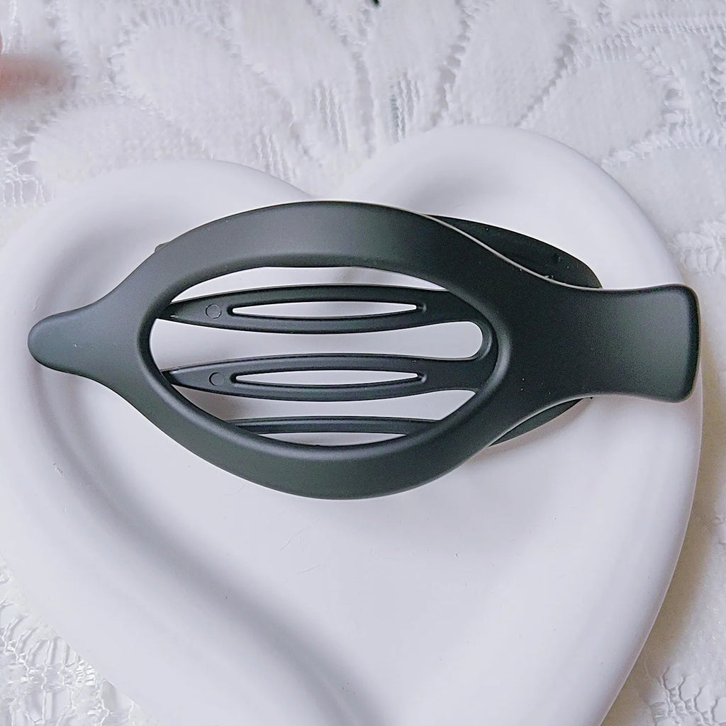 Six nude colour pointed toe hair clips with quadrilateral design and frosted plastic grips