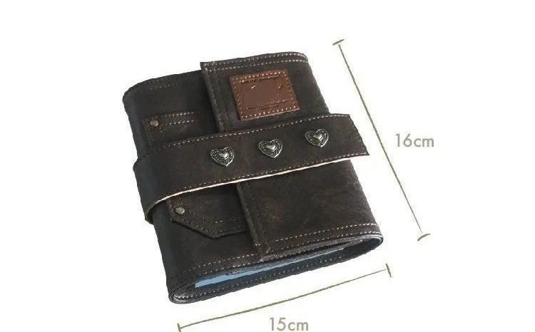 Brown retro-style A7 notebook with a PU cover and leather buckle, shown open to reveal loose-leaf binding.