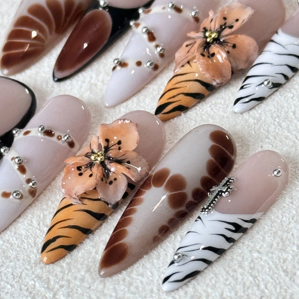 Handmade leopard print, cross and flower pattern acrylic nail stickers in XS, S, M, L sizes.