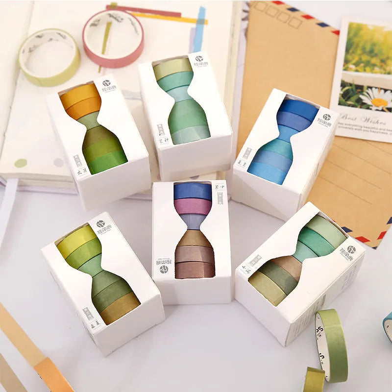Six rolls of 9mm wide decorative tape with 24 solar term designs on and paper for journaling