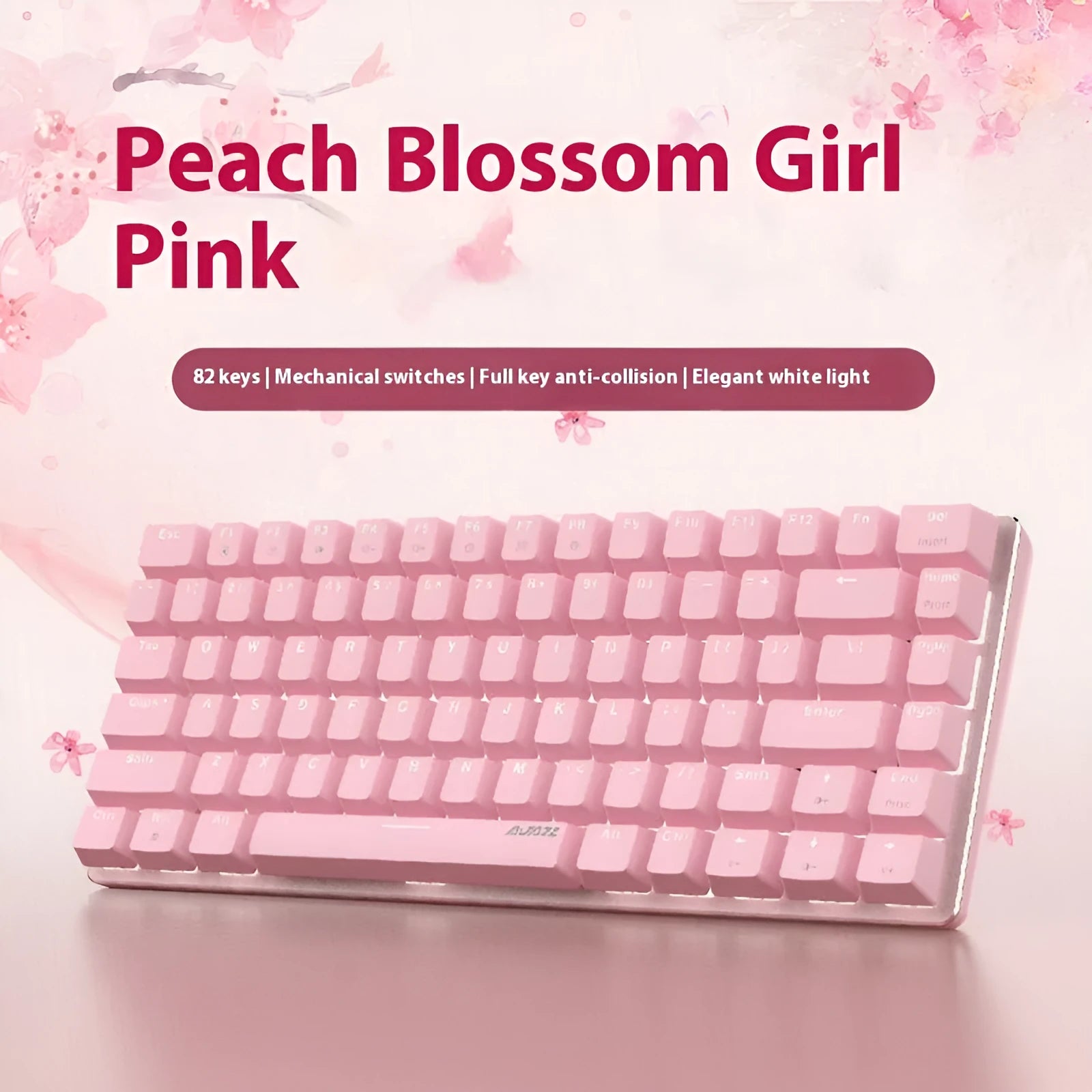 Compact white-backlit mechanical keyboard with 82 keys and metal body next to a laptop.