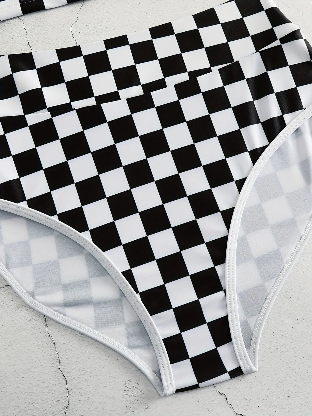Women's checkerboard pattern racing one-piece swimsuit with backless design and suspender straps