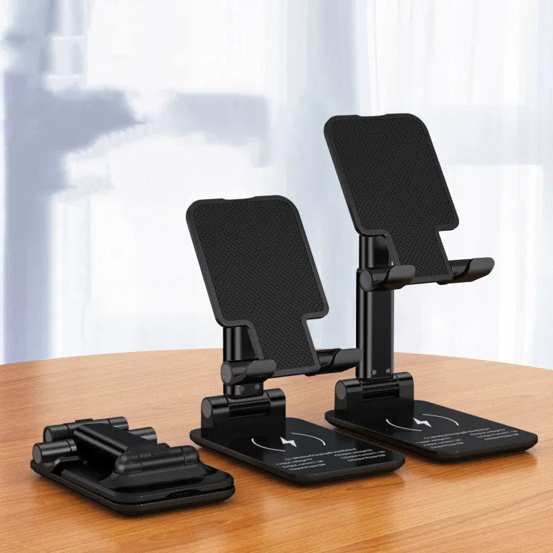 Black and white desktop wireless charging phone holder stand on a desk