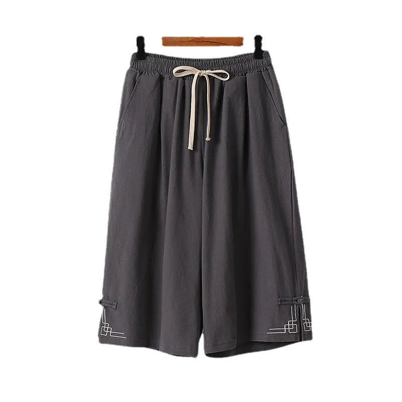 Women's apricot wide leg linen shorts with elastic waist on a hanger