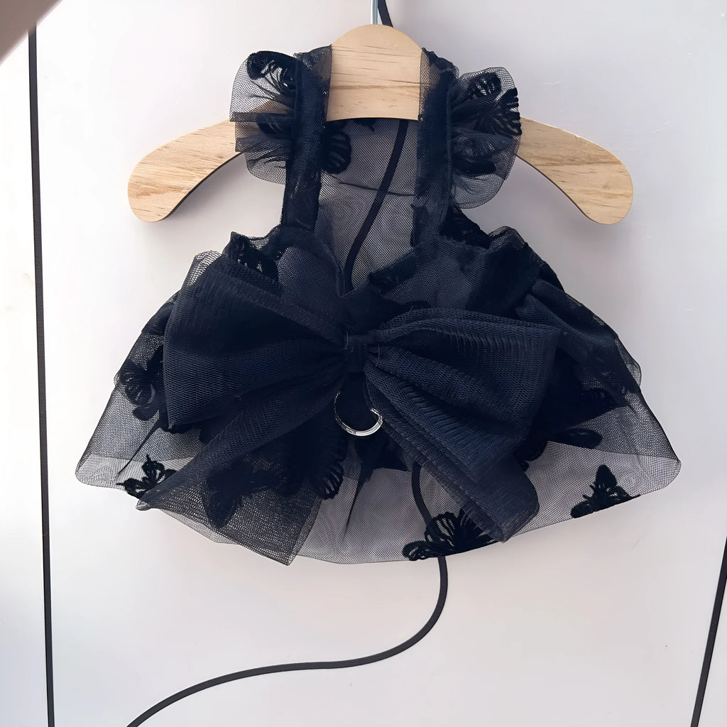 Black tulle princess skirt costume for a small dog on a mannequin.