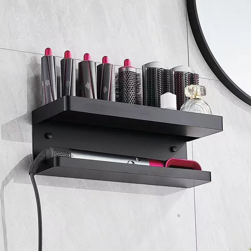 White double-layer punch-free aluminium rack holding hair curlers on a bathroom wall.