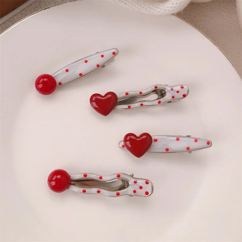 Red three-dimensional love heart hair clip with French dots and willow leaf decoration