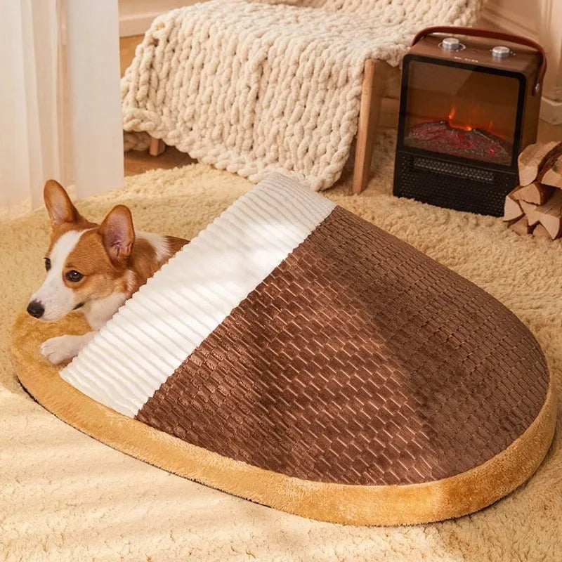 Blue round dog nest bed with removable cover for small medium dogs on a wooden floor