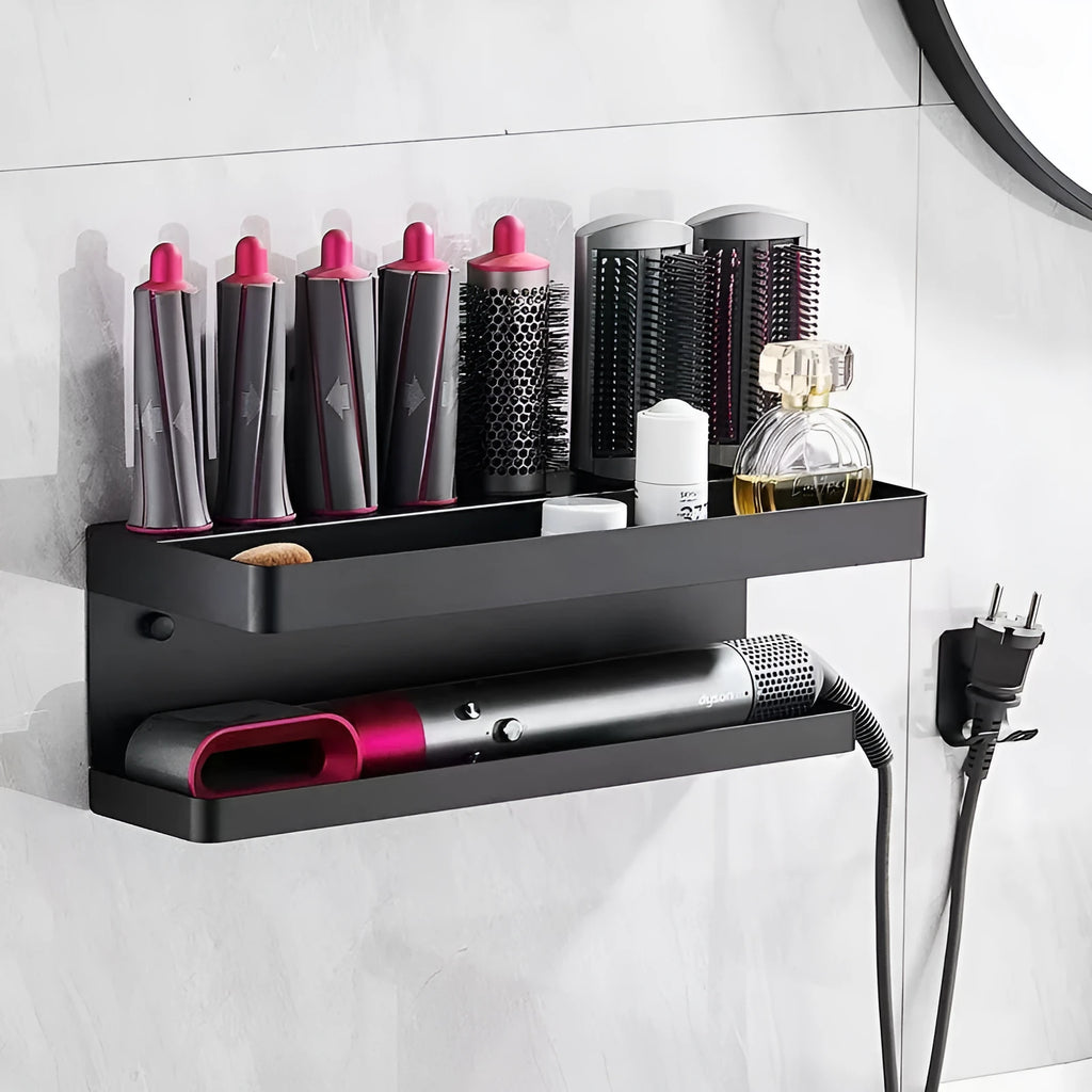 White double-layer punch-free aluminium rack holding hair curlers on a bathroom wall.