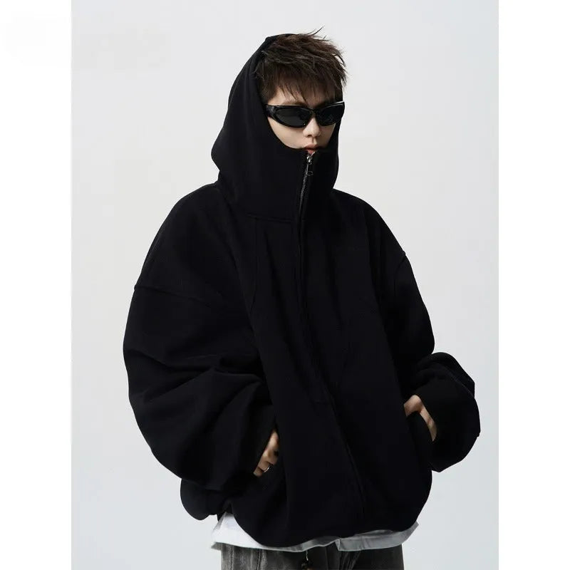 Loose fit black cardigan with side pockets, polyester fibre, drop-shoulder sleeves, available in sizes M to 3XL