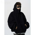 Loose fit black cardigan with side pockets, polyester fibre, drop-shoulder sleeves, available in sizes M to 3XL