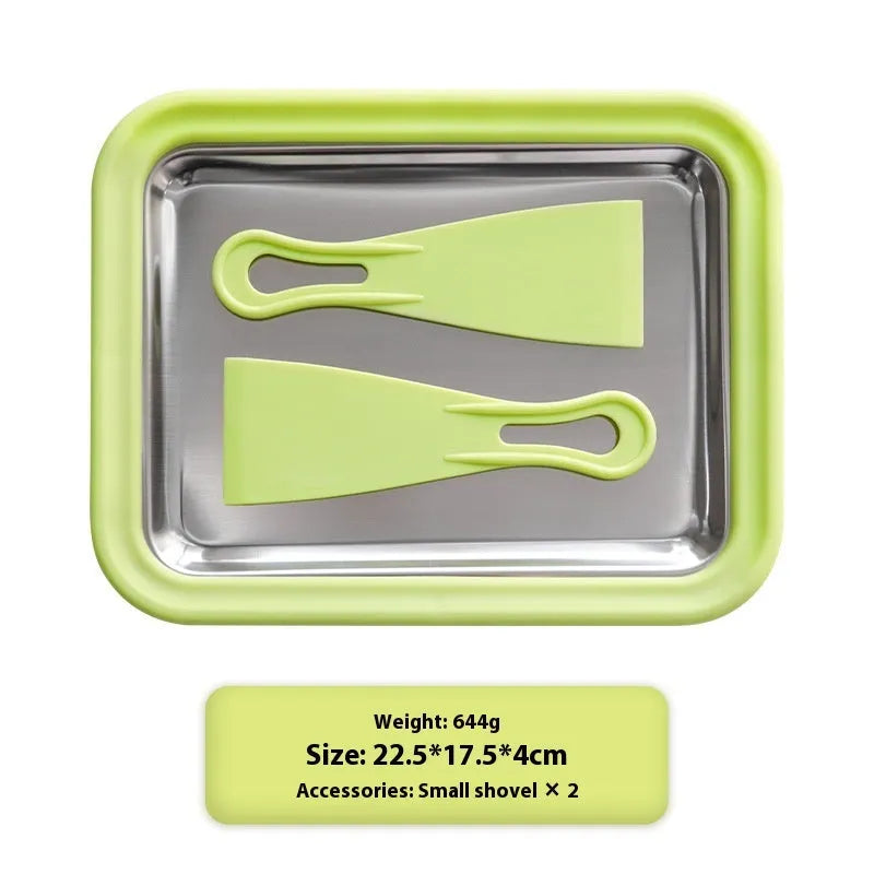 Green children's DIY fried ice and yogurt machine with aluminium gasket on a kitchen counter.