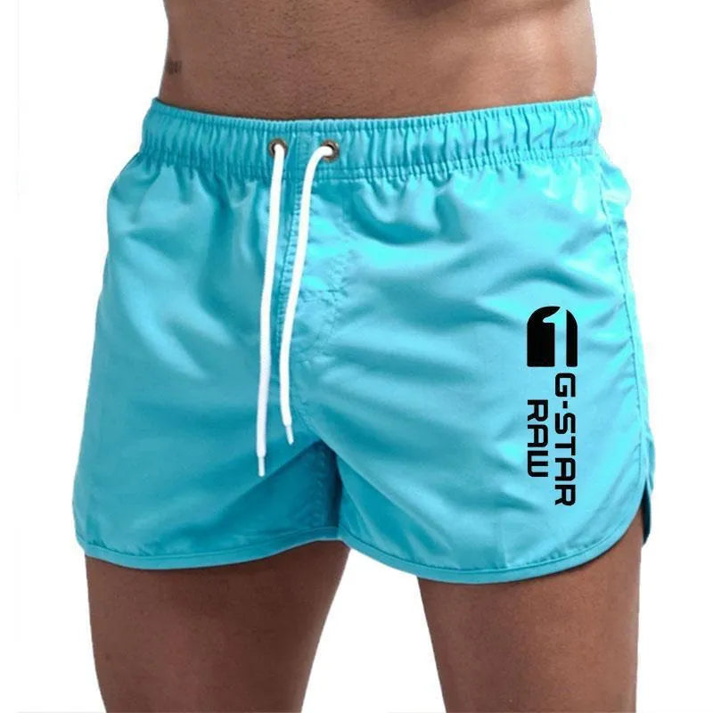 Men's lightweight hemp-blended polyester sports shorts in multiple colours with a micro-elastic waistband.