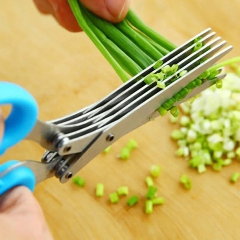 Green multi-layer stainless steel kitchen scissors for cutting herbs and green onions.