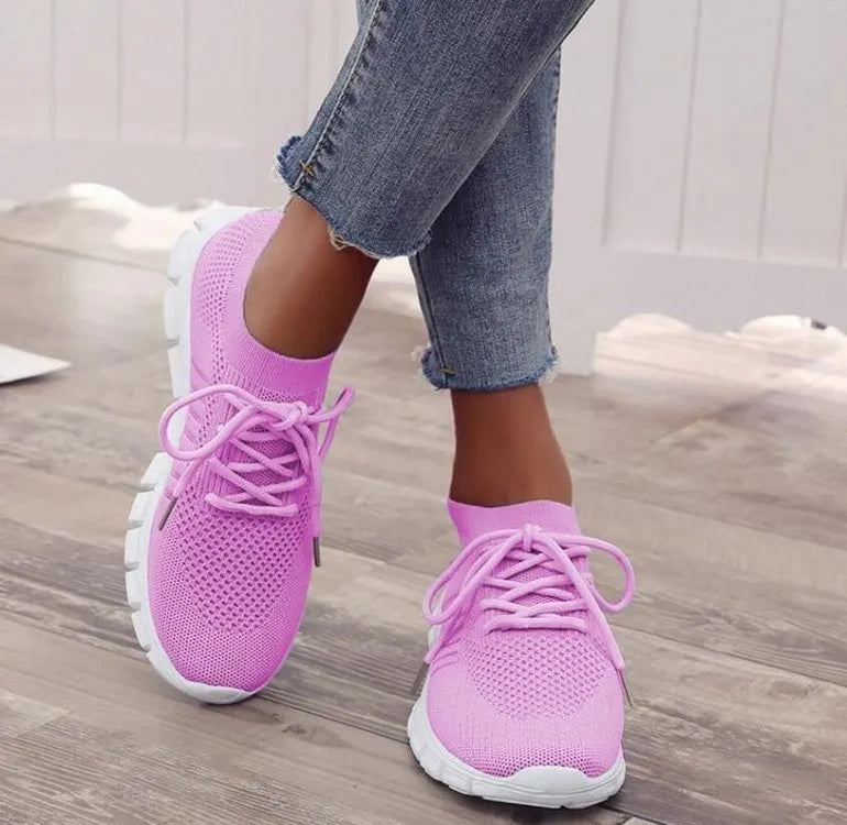 Women's high-cut lace-up platform sneakers in a casual style with a breathable upper and rubber sole