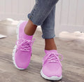 Women's high-cut lace-up platform sneakers in a casual style with a breathable upper and rubber sole