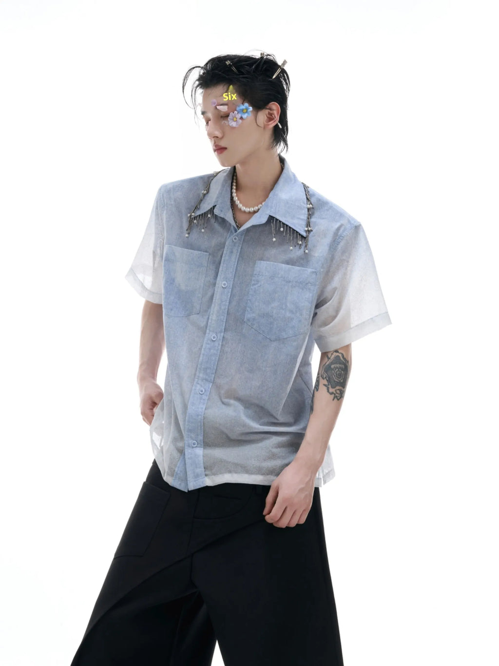 Men's blue and white gradient loose-fit short sleeve summer shirt on a hanger.