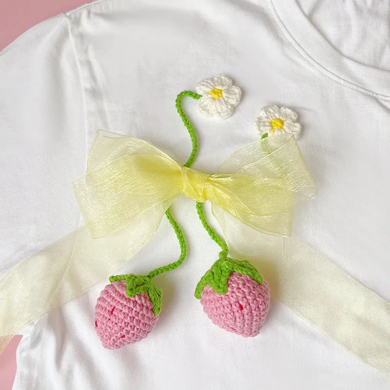 Handmade wool crochet woven strawberry pendant on 35cm chain in pink colour
