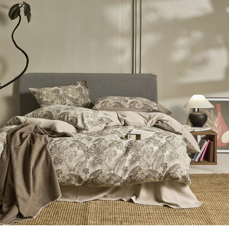 Linen cotton bedding four-piece set with jacquard plant pattern on a 1.5m double bed in Jinlan Gray colourway