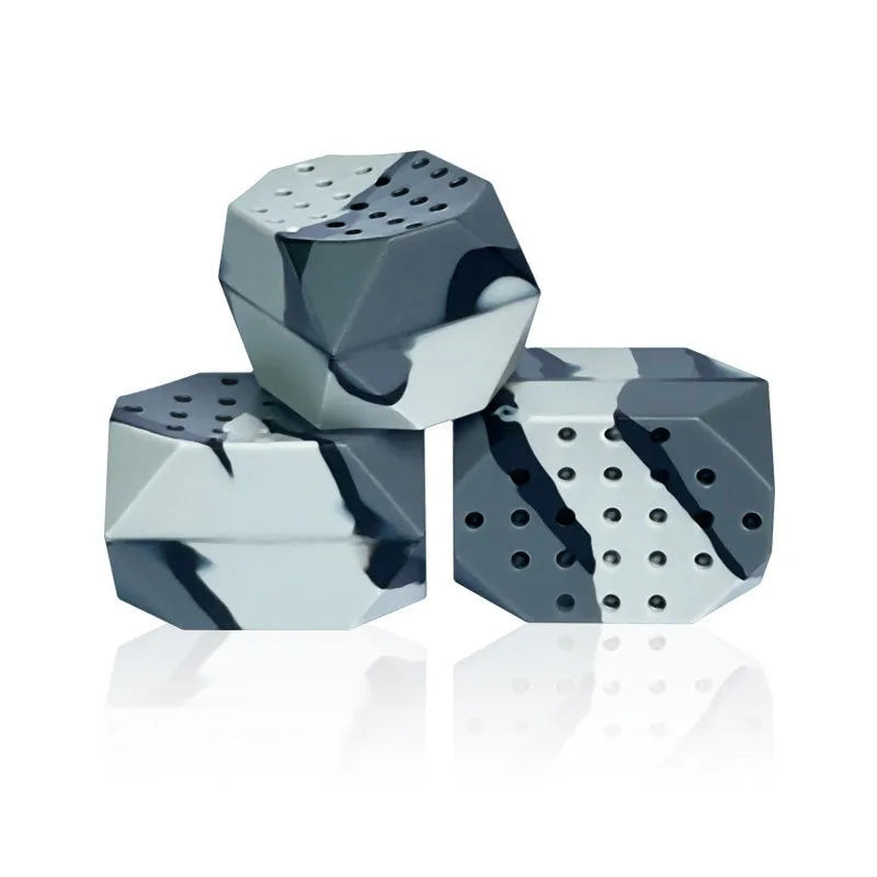 Two camouflage-pattern silicone facial exercise balls in a transparent box.