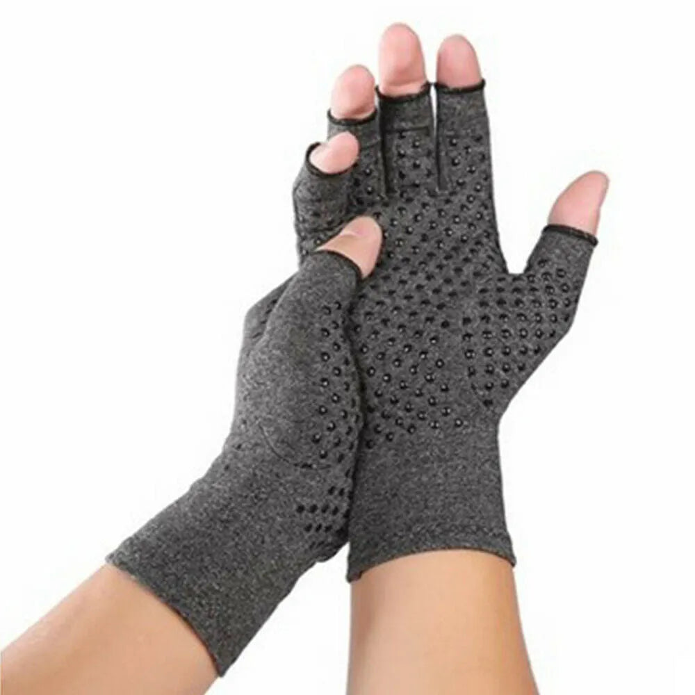 Grey half-finger joint compression gloves made from Trueran spandex fabric on a hand.