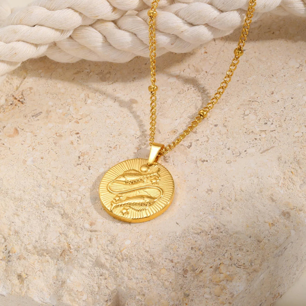 Stainless steel zodiac constellation necklace with twelve charm pendants on cross chain