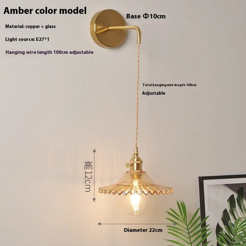 Retro brass lotus wall lamp with copper base and glass shade in one of six colours.