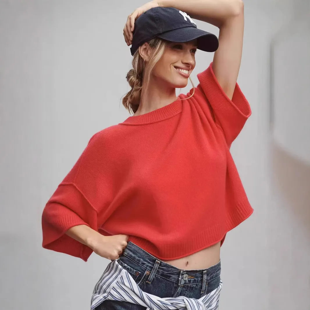 Red short viscose T-shirt with regular sleeves and an exposed navel design on a mannequin.