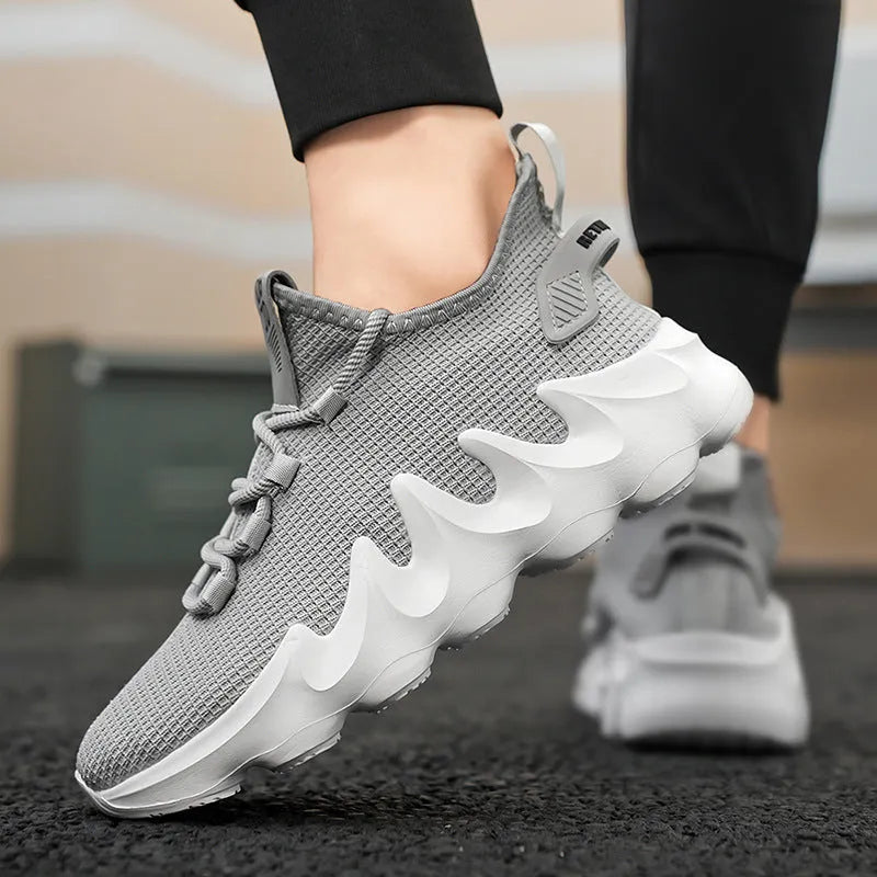 Men's grey lightweight sock-like sports shoes with flat heel and lace-up front
