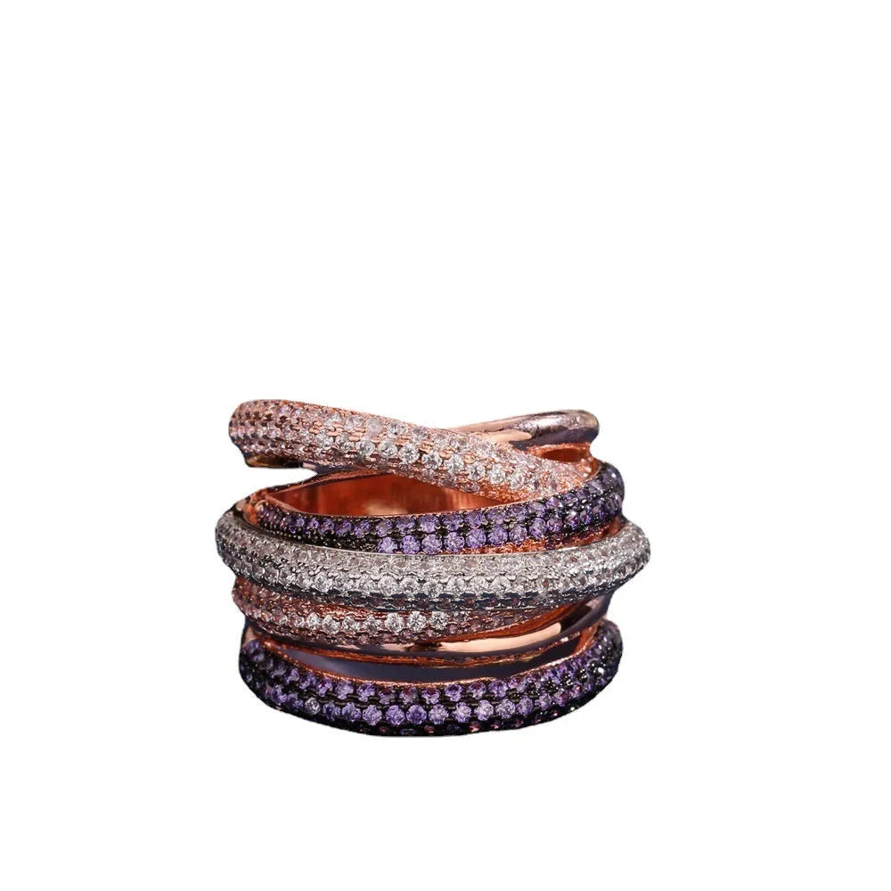 Women's geometric cross line ring with colour-separated zirconia stones in green, red, yellow, purple on a copper band